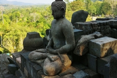Borobudur - Buddha on the wall